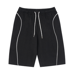 Black shorts with white piping on a white background
