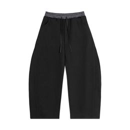 Black pants with plaid waistband on a white background