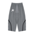 Gray sweatpants with a star logo on a white background
